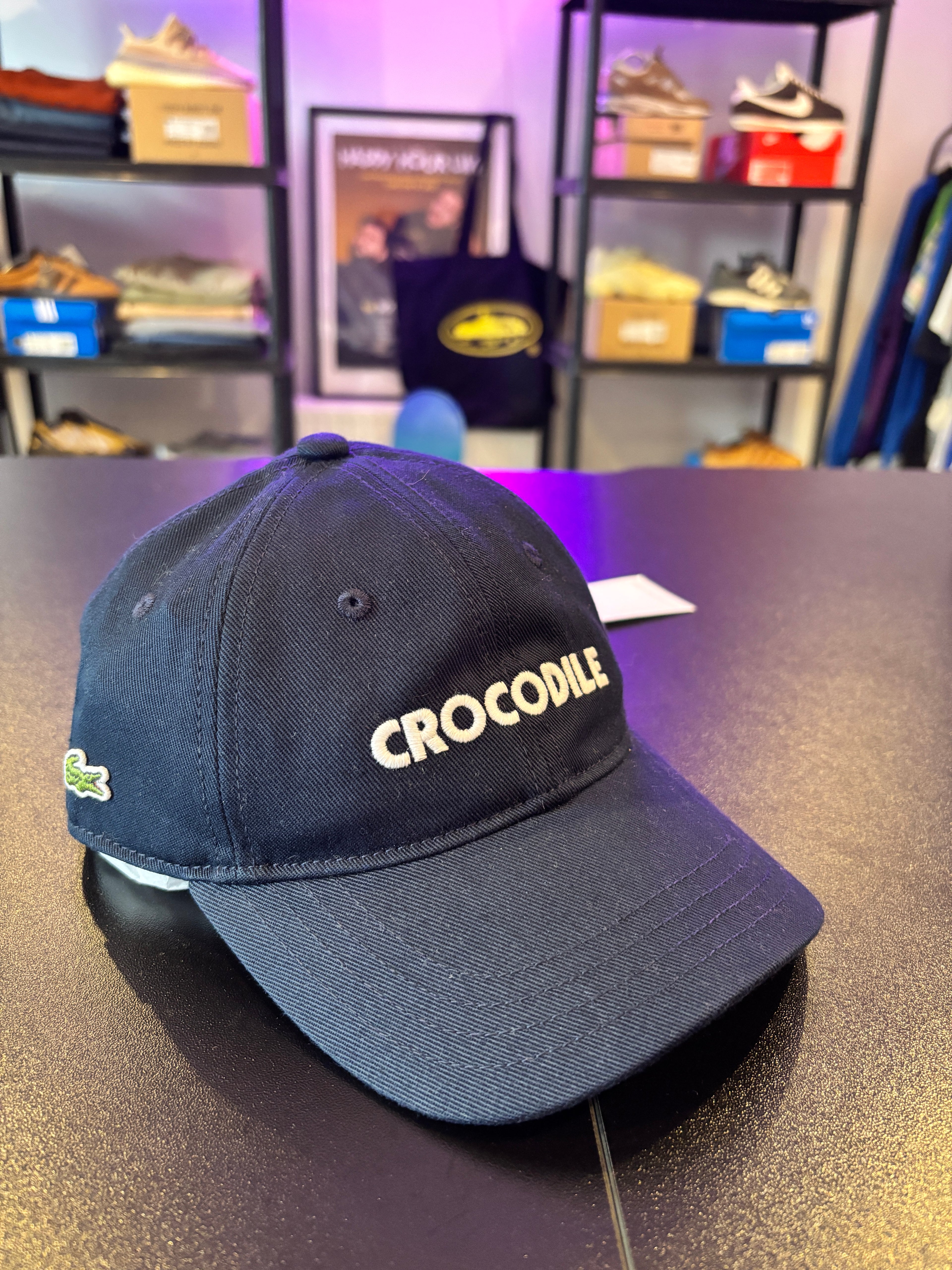 CROC SPELLOUT CAP NAVY 2-5 YEARS