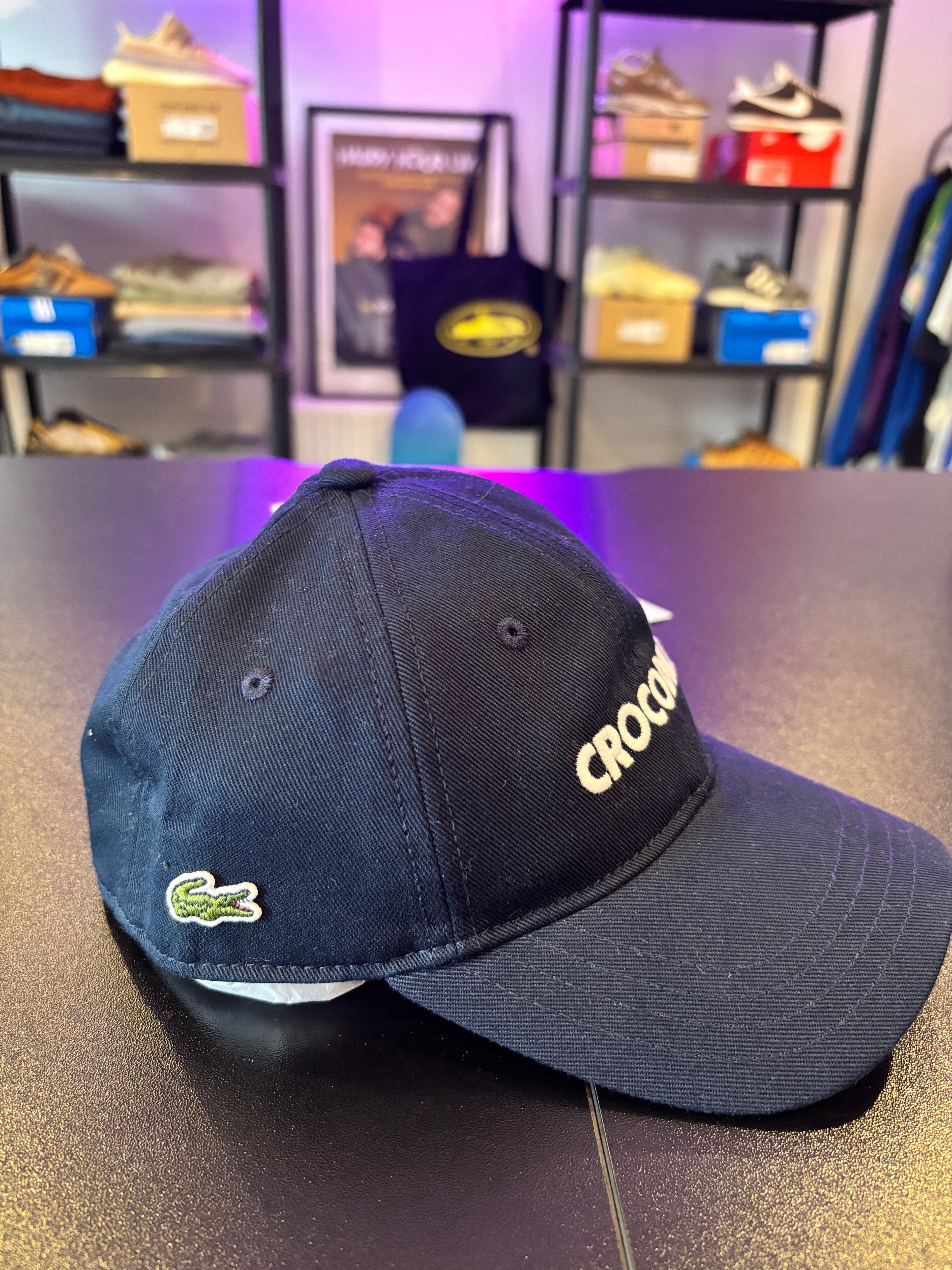 CROC SPELLOUT CAP NAVY 2-5 YEARS